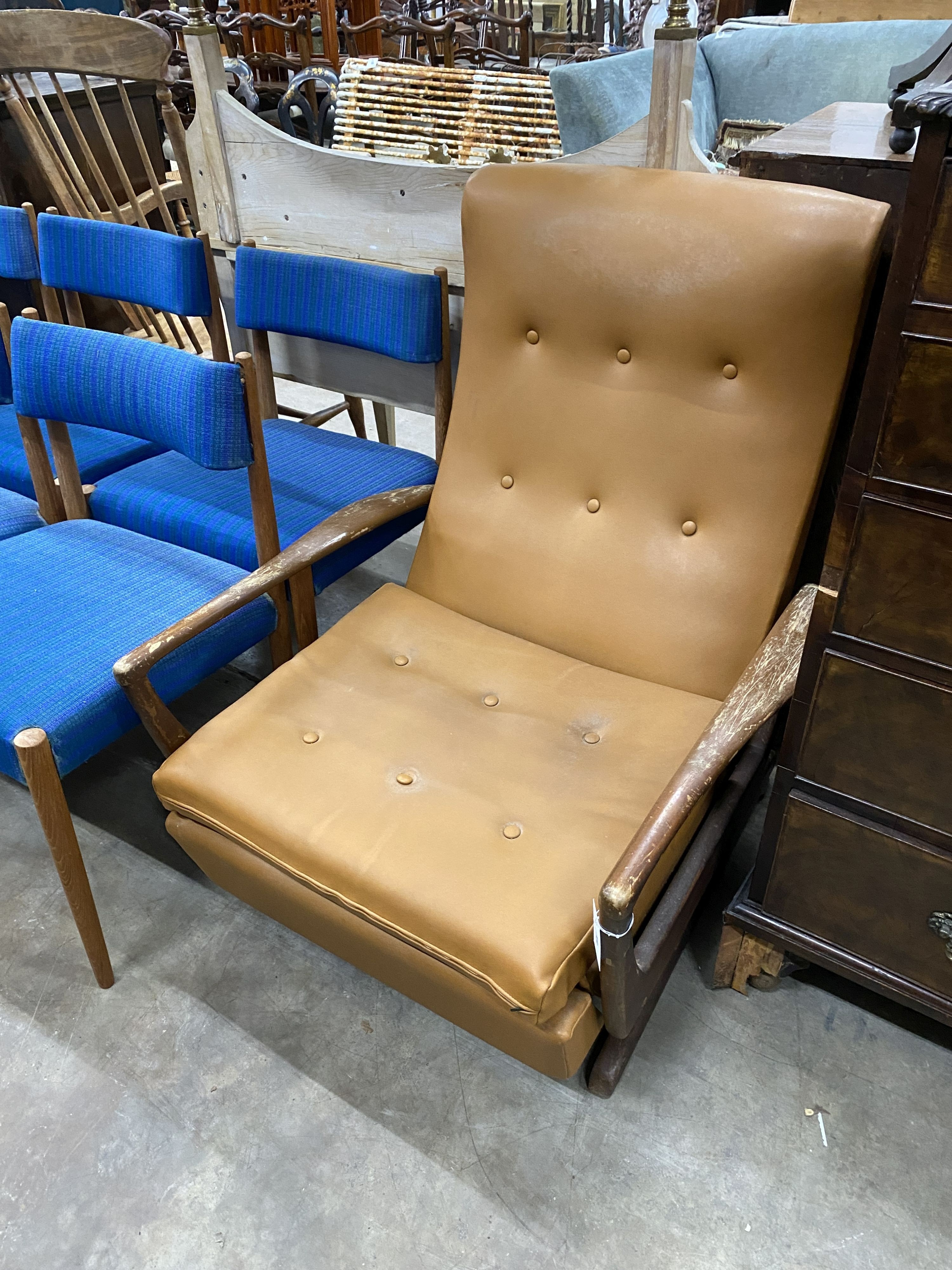 A mid century Parker Knoll model No. RK1020 reclining armchair, width 77cm, depth 88cm, height 94cm